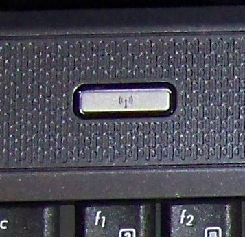 Кнопка включения WiFi слева над клавиатурой